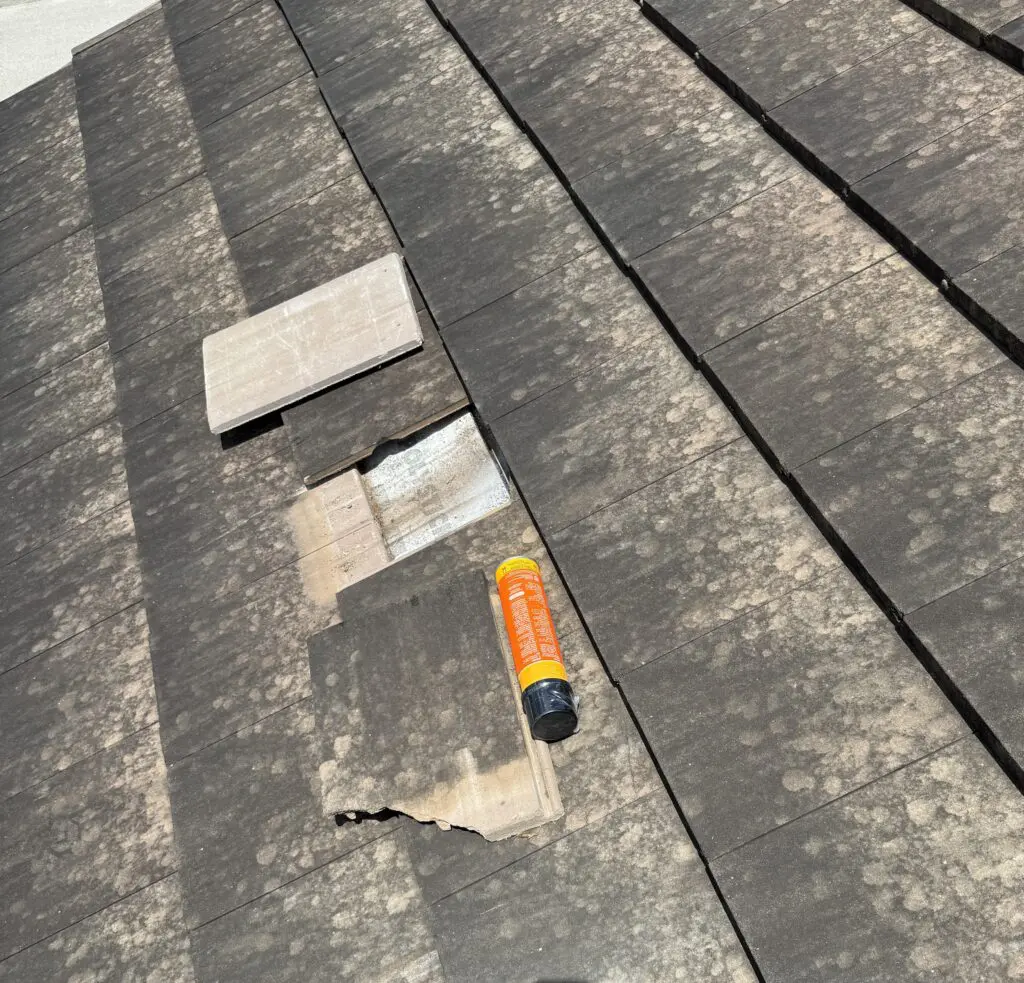Replacing damaged roof tile