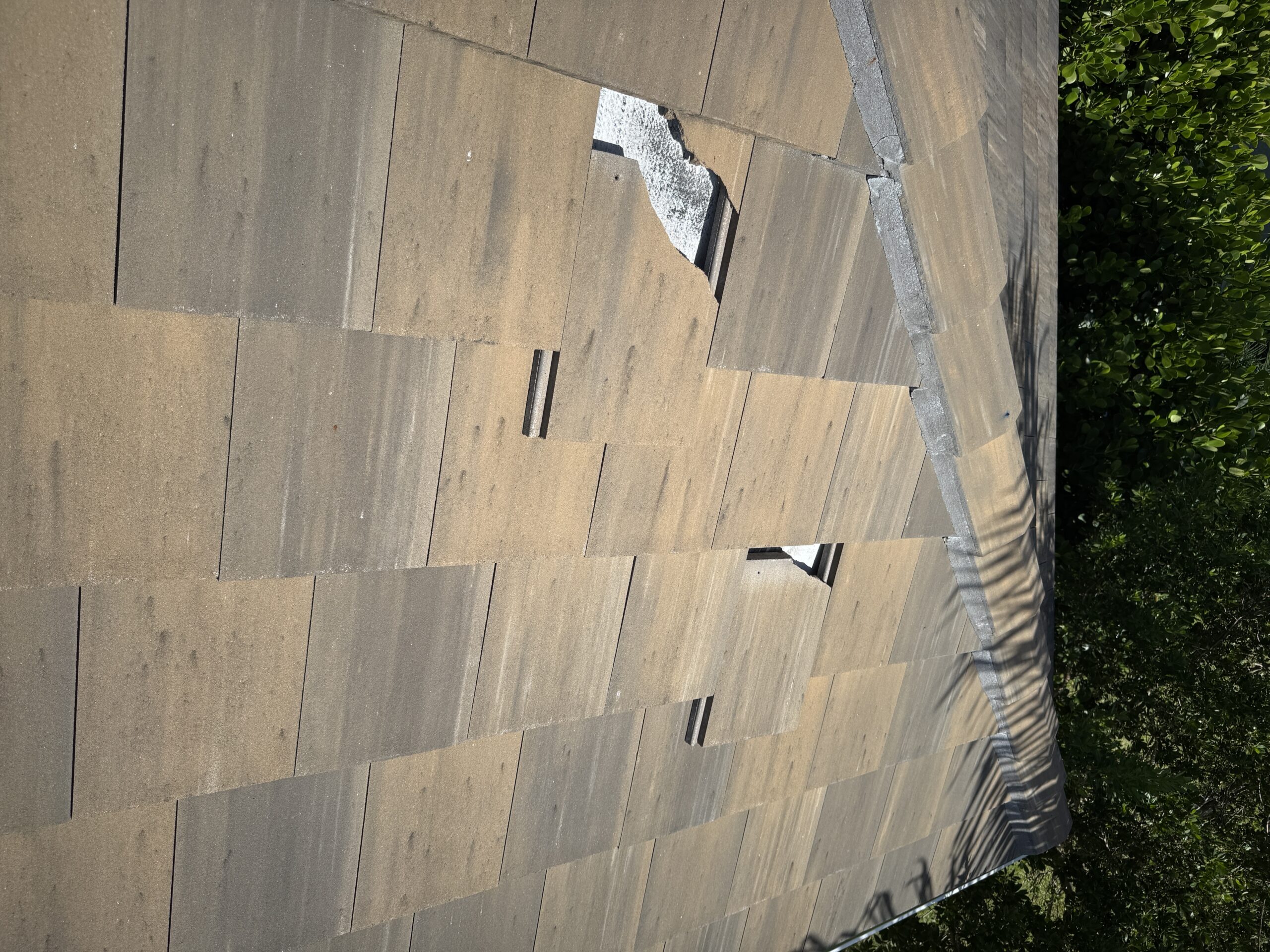 Cracked, slipped tile on a roof in Cape Coral FL