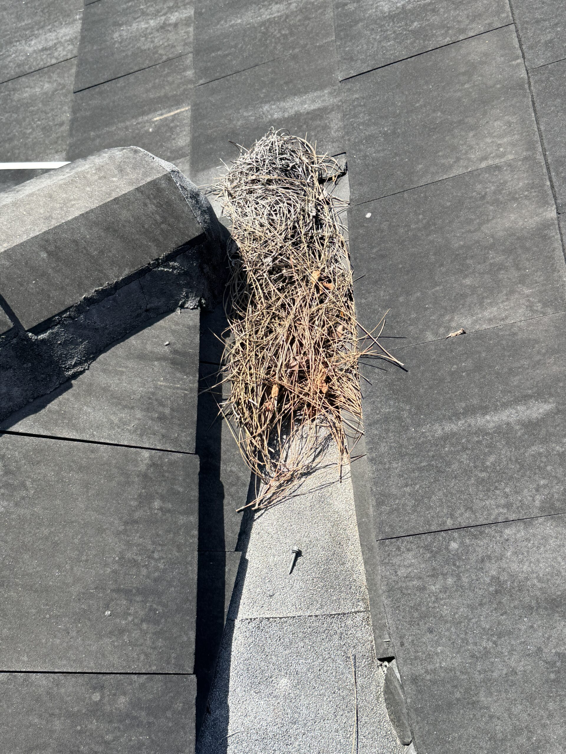 Clogged Valley Termination on Tile Roof in Fort Myers, FL